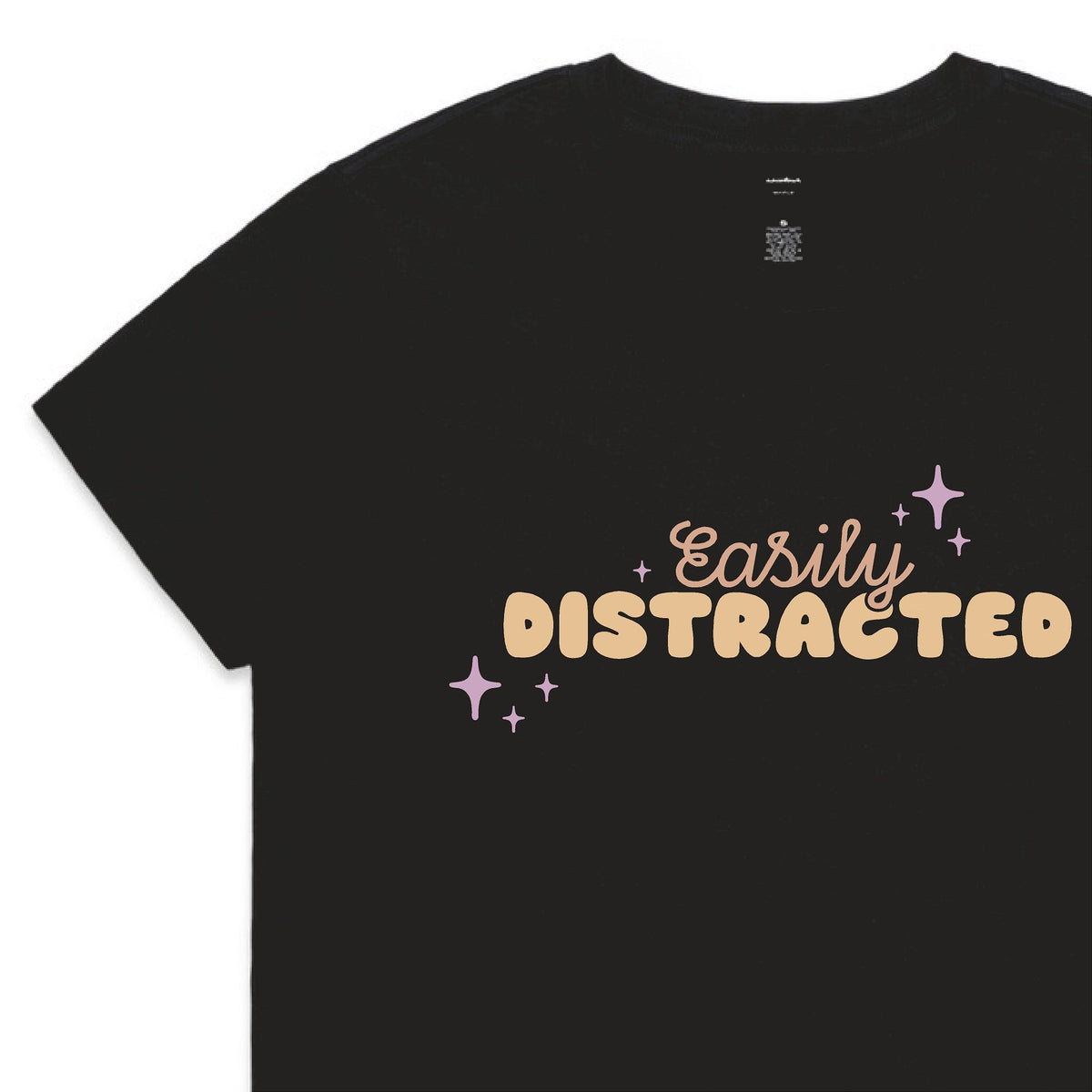 White t-shirt with 'PROFESSIONAL OVERTHINKER' text in pastel colors on a white background