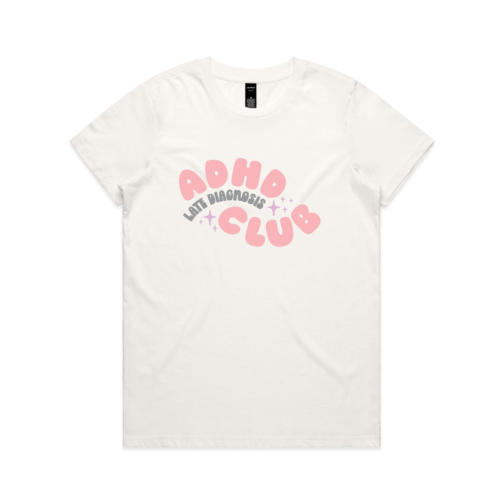 White t-shirt with pink text 'ADHD Club' on a white background
