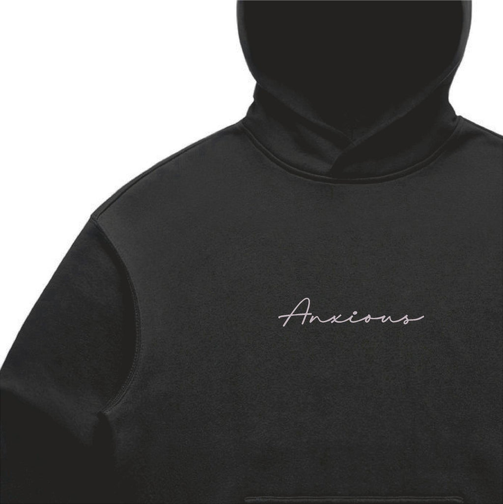 Black hoodie with 'Anxious' text on a white background