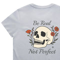 Light blue t-shirt with a skull design and text 'Be Real Not Perfect' on a white background