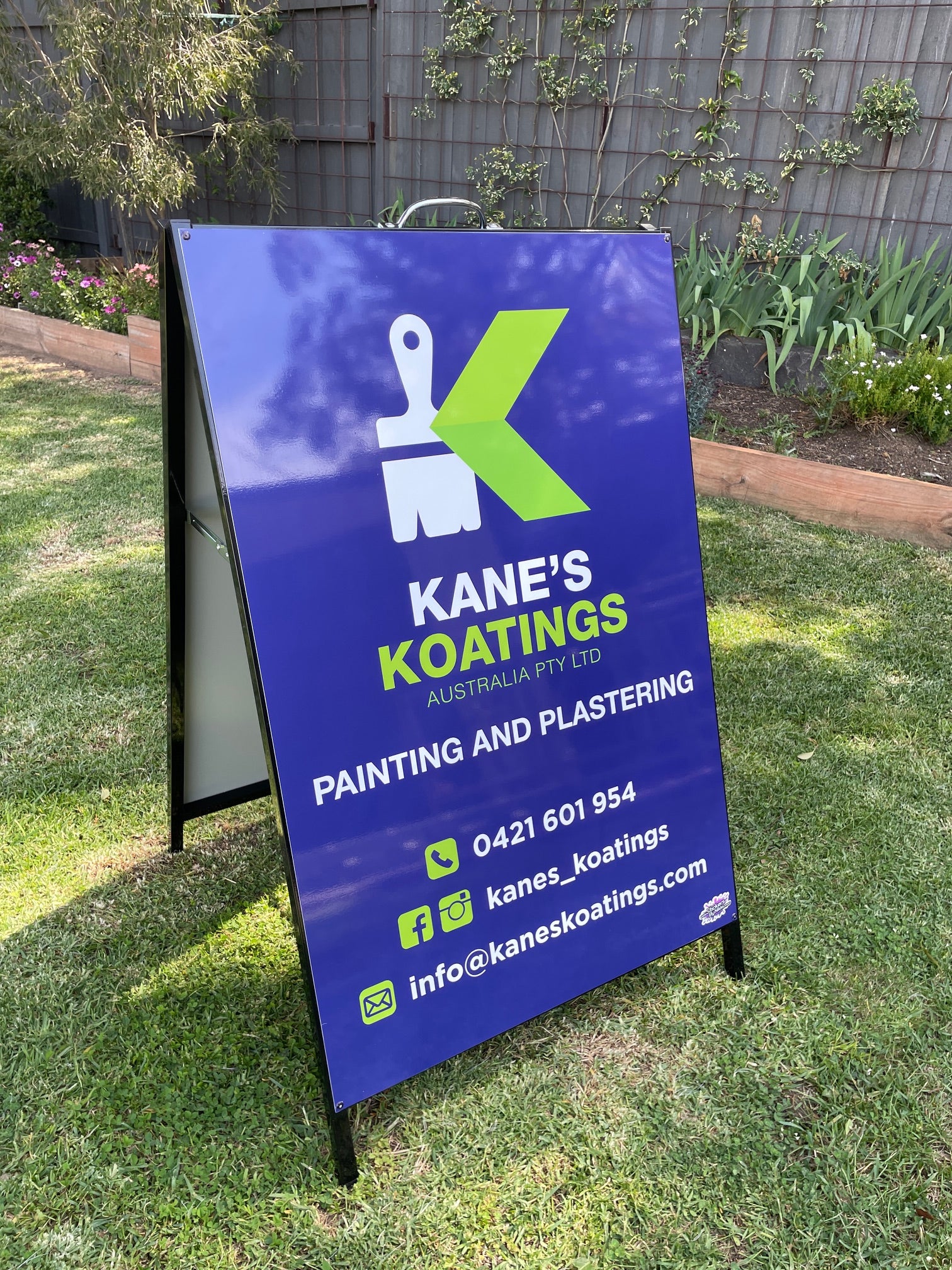 Kane's Kaotings | Painting and Plastering sign on grass