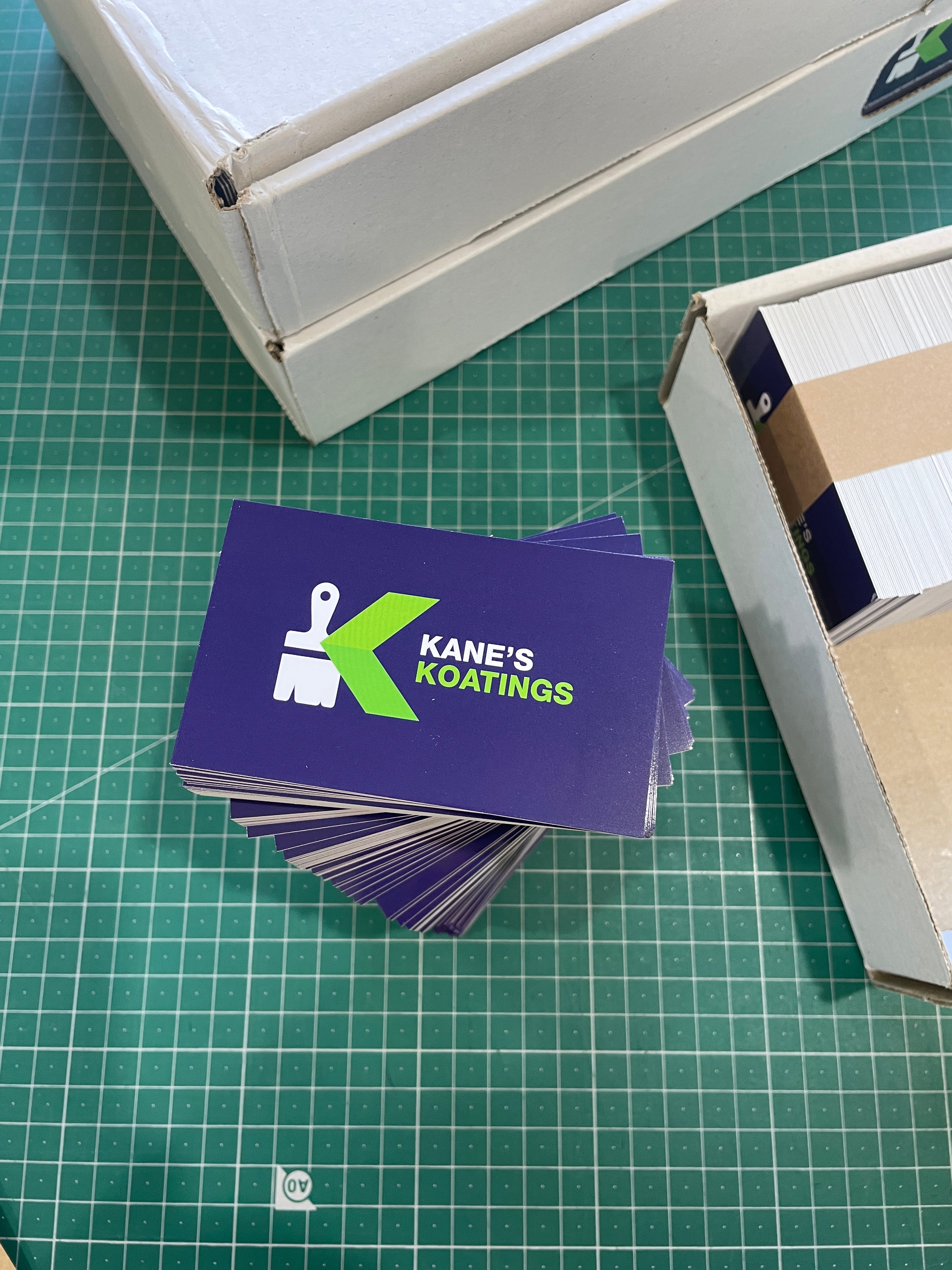 Blue Business Cards Stacked on a work surface